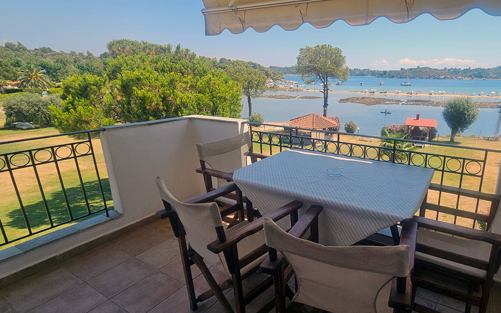 Balcony with seating and sea view from Classic Studio No34 at Bloomora.