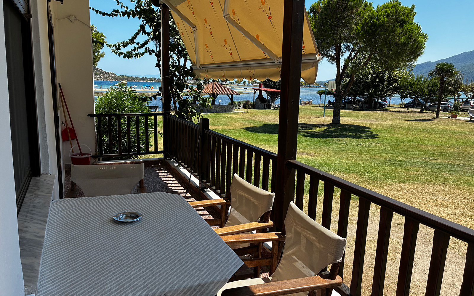 Balcony with garden and sea view from Junior Studio No1 at Bloomora.